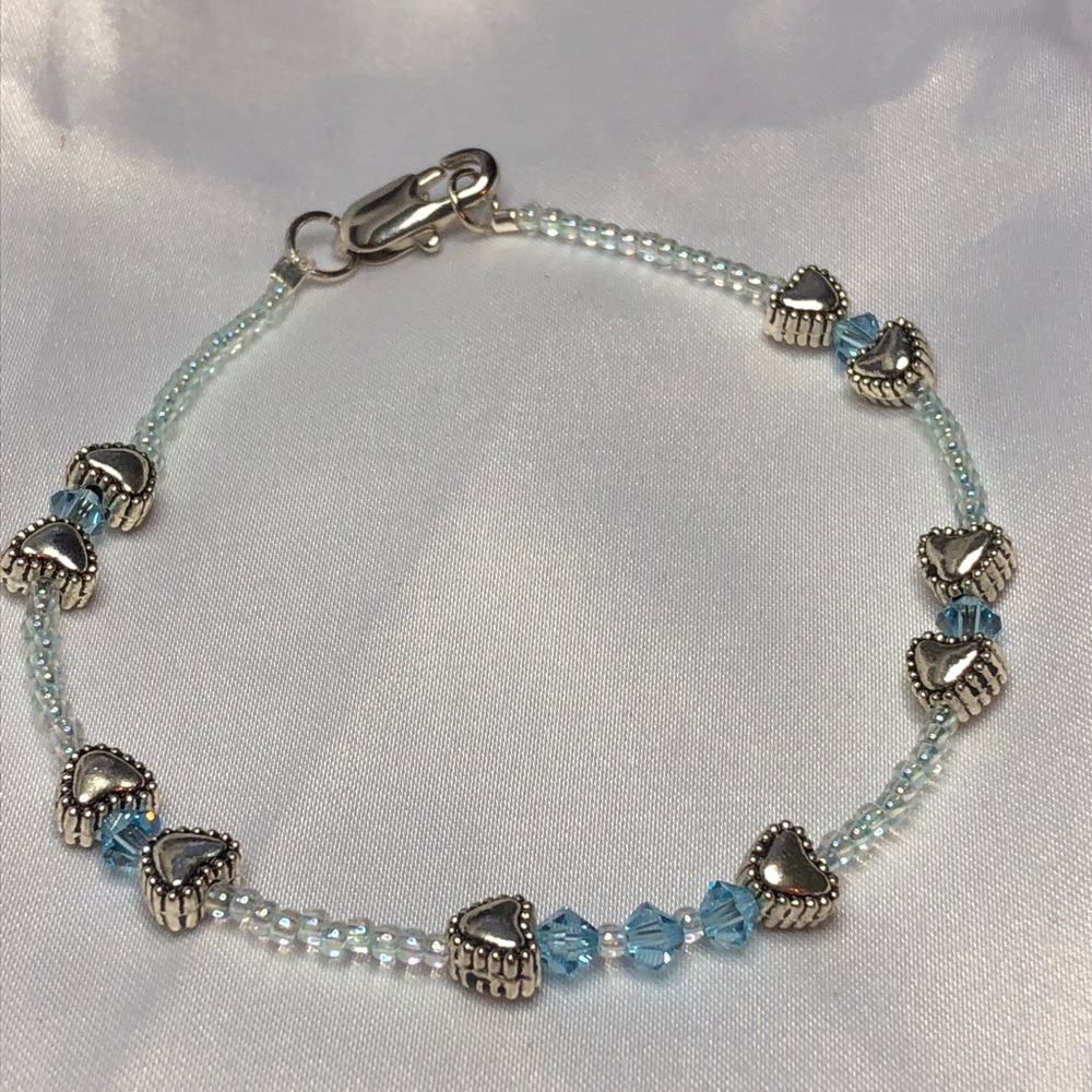 Blue crystal and hearts bracelet.